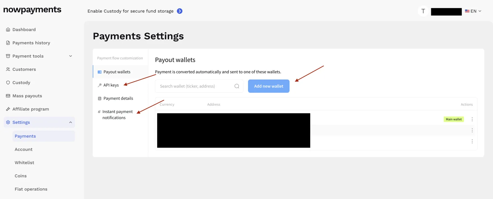 NOWPayments Payments Settings screen showing Payout wallets, API keys, and Instant payment notifications in the side menu
