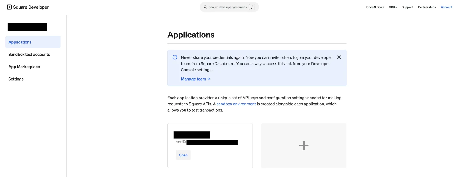 Square Developer Applications screen with an existing app card and a + tile to create a new application